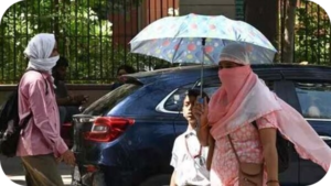India weather update showing heatwave in north India and heavy rain with strong winds in northeast states